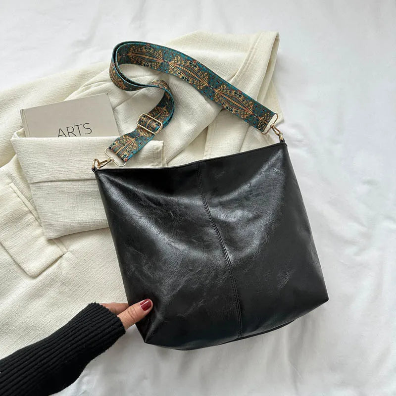 Borsa a tracolla in pelle con fascino vintage di Chelsey
